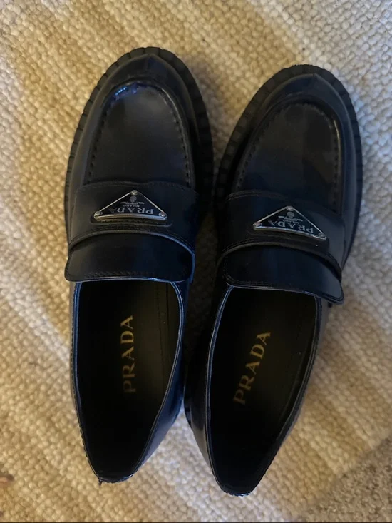 Black Leather Penny Loafers with Metal Triangle Logo - Picture 2 of 3